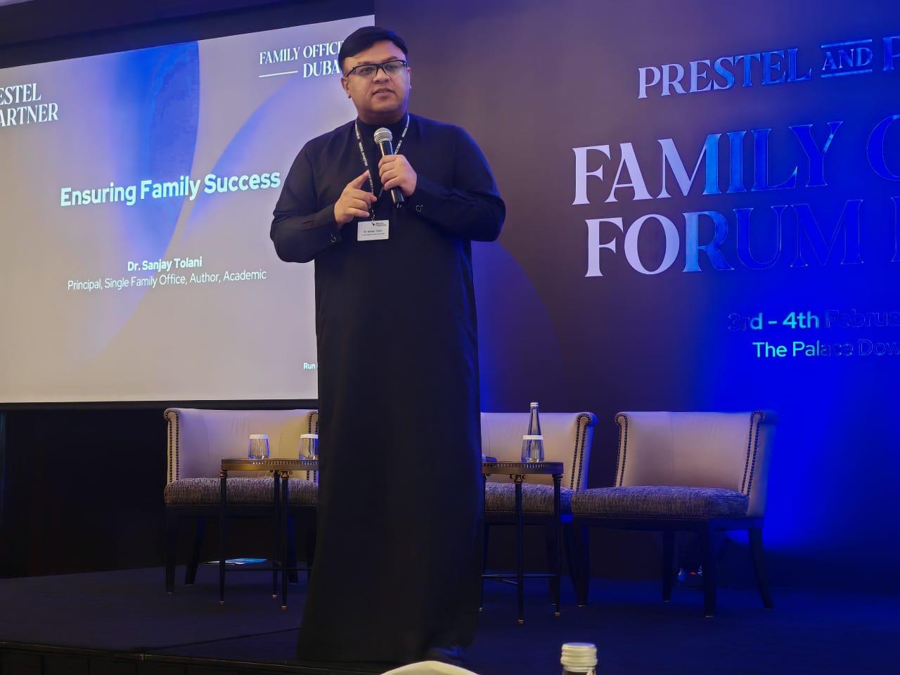 Dr. Sanjay Tolani speaking at a family office forum